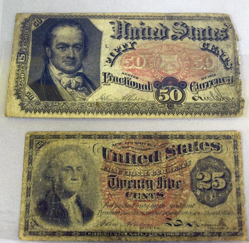 Fractional Currency 50 cents and 25 cents: Twenty five cents has George Washington and 50 cents has John Wilson on it dated 1875 and Washington is March, 1863