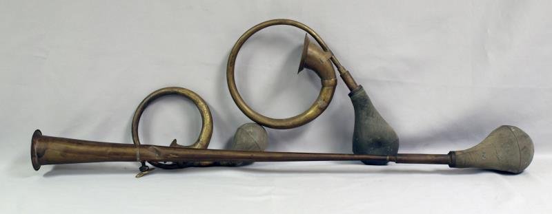 Three vintage brass horns: Long horn is 34" long, smaller ones are 13" and 9", kind of neat believed to be old car horns