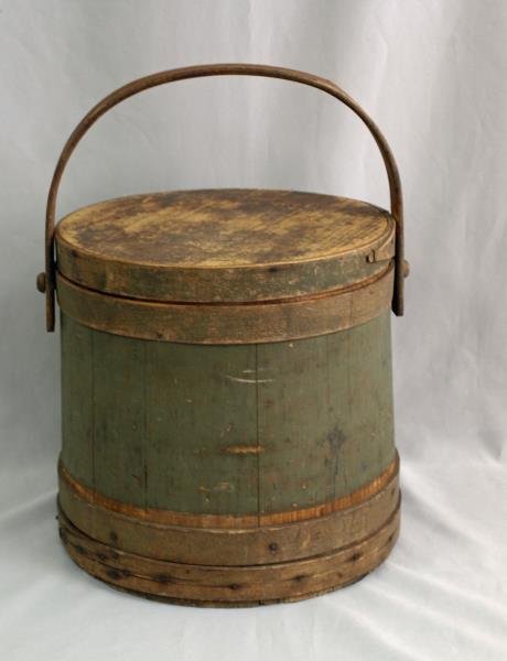 Painted Green Firkin or Sugar Bucket: Milk paint green, measures 12" across the top and 11.5" tall. It has a hole in the bottom of the bucket & a tin plate in the bottom. I have included photos.