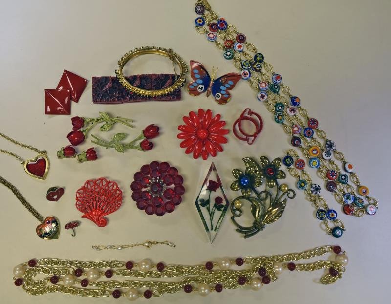 Collection of Mid-Century Red & Goldtone Jewelry: Consisting of Coro red rose earrings with two pins, acrylic rose pin, red rhinestone bangle, Millefori necklace and bracelet, mid-century metal flower pins and other pieces of costume jewelry