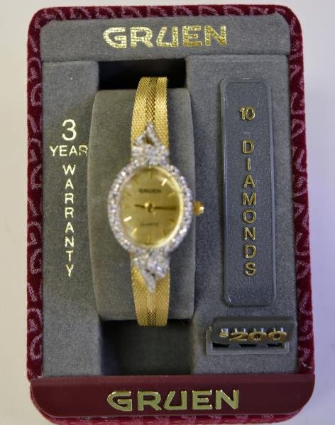 Ladies Gruen Wristwatch: Consists ten diamonds on the face of the watch in original box never used.