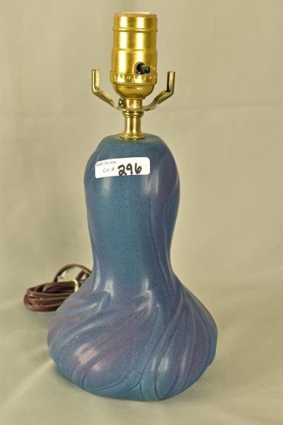Van Briggle Reed & Flower Lamp: In the lilac blue, measuring 12" tall and 6" wide, mint condition, never used, no nicks, chips or cracks, working. Circa 21st Century