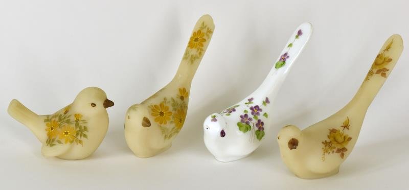 Fenton Custard Pained Birds Consisting of three custard: Consisting of three custard glass painted birds by Sandy Kelley, Lisa W. and Gracie Y., and a white violet painted bird by Kay Whitman. All are in good condition, no nicks, chips or cracks.