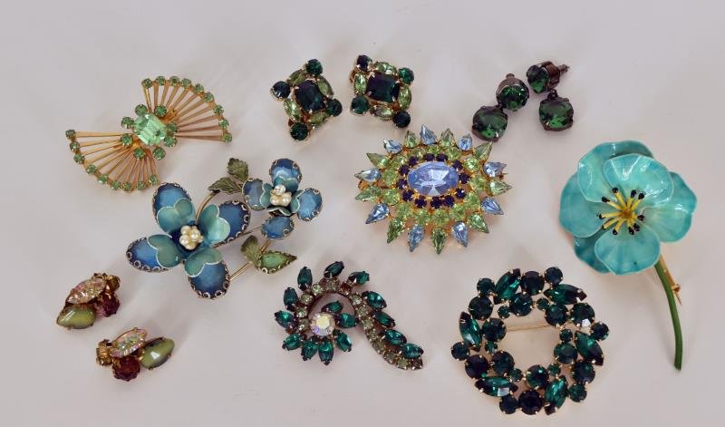 Group of Green Rhinestone Pins & Earrings Featuring a: Featuring a Robert pin, Coro, Made in Austria, Made in West Germany and others.