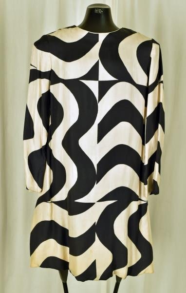 Joan Leslie Silk Black and Cream 1960s MOD Dress This: This is a Joan Leslie 1960s by Kasper Mod Dress. The material is silk with some discoloration. The sides have pleats. A very one-of-a-kind dress. Size 6-8. Have fun!!