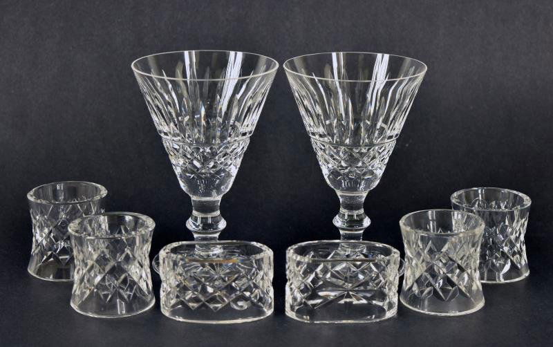 Waterford Napkin Rings & Tramore Goblets Consisting of: Consisting of two Tramore goblets 5 3/16, a different size than the previous goblets. Together with eight crisscross napkin rings all marked Waterford, there are two additional napkin rings matching b