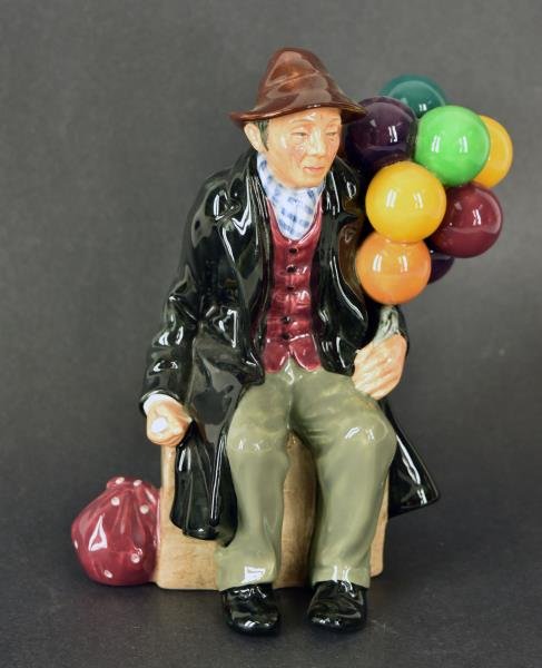 Royal Doulton "The Baloon Man" Measuring 7" tall, in: Measuring 7" tall, in good condition, no nicks, chips or cracks.
