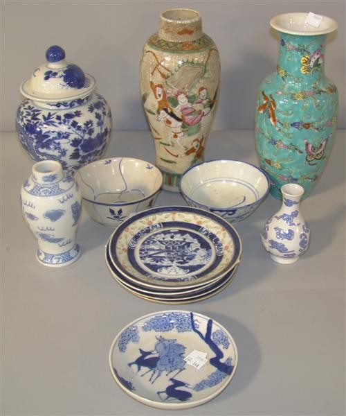 GROUP OF CHINESE PORCELAIN ITEMS: Including two famille rose vases, a blue and white ginger jar and a cover, two blue and white bowls, two small blue and white vases, a Japanese blue and white dish with deer, and four rice patterned d