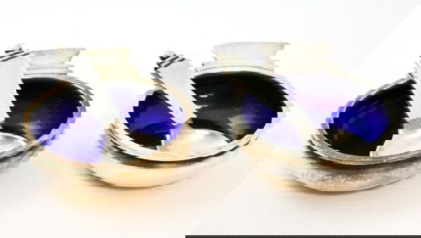 2 GEORG JENSEN PYRAMID STERLING SALT CELLARS: Pair of Danish silver salt cellars with cobalt enameling by Georg Jensen in the Pyramid (Pyramide) pattern. Original spoons also included. Pattern No. 15. Patent date 1927. Weighs 2.030 ounces troy (6