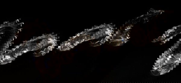 BACCARAT FRANCE SEA SERPENT FIGURE: 4 piece crystal figure. Depicts a sea serpent as if it is partially submerged in water. Each piece has the Baccarat water mark and the head also has etched Baccarat mark to side. Tail measures 3" H (7