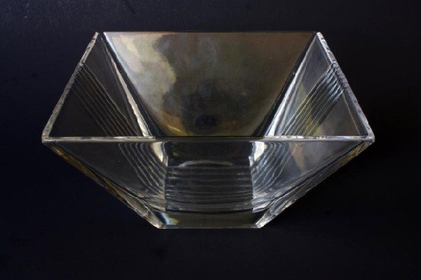 KRISLA ITALIAN CRYSTAL SQUARE BOWL TIFFANY & CO: Has a square shape with parallel line design. Kristal Krisla Italia watermark to bottom. Tiffany & Co watermark also to bottom. Measures 4 1/2" H x 8" W x 8" D (11.5cm x 20.5cm x 20.5cm)