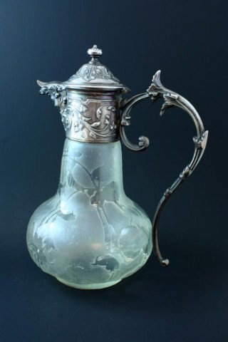CHRISTOFLE FRANCE GALLIA METAL & CRYSTAL PITCHER: Has a beautiful raised scrolled design to the silver top and handle. Spout has a figural spout design. Crystal has an etched frosted design. Made of "Gallia Metal" (pewter) by Christofle France. Roost