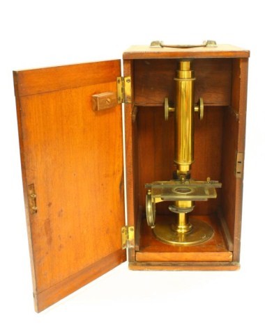 J. ZENTMAYER ANTIQUE MICROSCOPE CIRCA 1900: A fine J. Zentmayer microscope with original mahogany case. The beautifully crafted lacquered-brass microscope engraved on round base ''J. Zentmayer Philadelphia." Includes a variety of optical access
