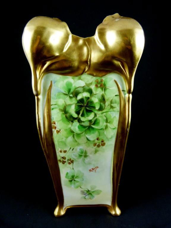 RICHARD GINORI ART DECO FLORAL GILTED VASE: Has a beautiful green floral hand painted design with gilting. Signed "M. Rava". Ginori marks to bottom. Measures 9" height (23cm).