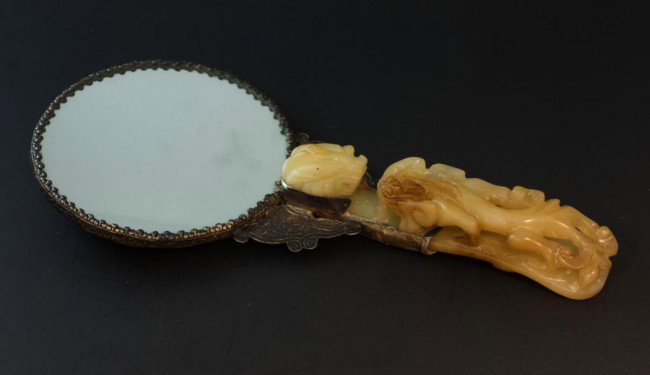 CHINESE JADE SCEPTER w CARVED CHIHLUNG MIRROR: Silver & Jade mirror. Has a fabulous repousse dragon design to back of mirror. Has a filigree design to back of handle mount. Figural Jade Dragon Handle. Has a floral design edge. Measures 9" h x 4 1/