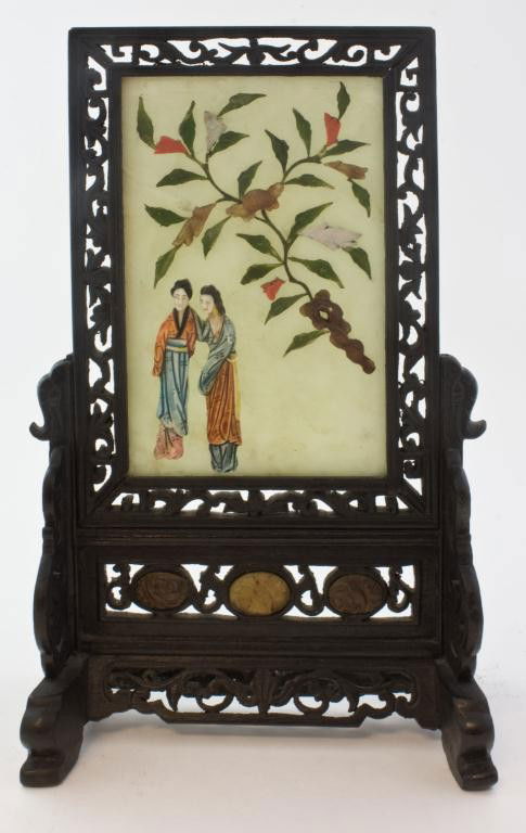 ORIENTAL JADE IVORY & RED CORAL SCREEN w STAND: Beautifully decorated screen is consructed of a slab of jade with ivory polychromed figures and pieces of red coral, green jade, purple jade and other stones. Set in a hand carved wooden frame. Frame