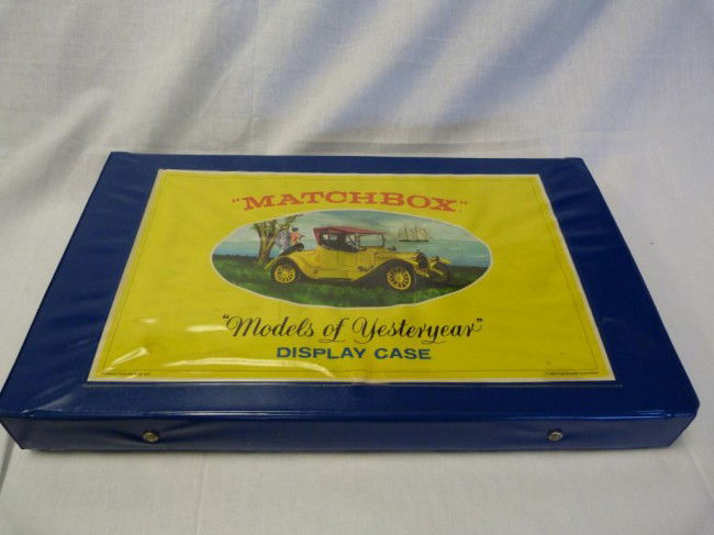 VINTAGE EARY 1970's MATCHBOX MODELS OF YESTERYEAR: Produced in England by the Lesney Company. Collection contains 16 die cast vehicles in its original display case, with handle. A great pickup for any and all Matchbox enthusiasts.