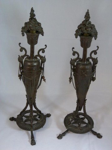 PAIR OF FRENCH BRONZE FOOTED CANDELABRAS LEBLANC: Intricately detailed French bronze candelabras. Each has 3 hoofed feet holding up a panel with a 6 point star and 3 beetle design. 3 stalks of wheat extend from the base and hold up the main body of t