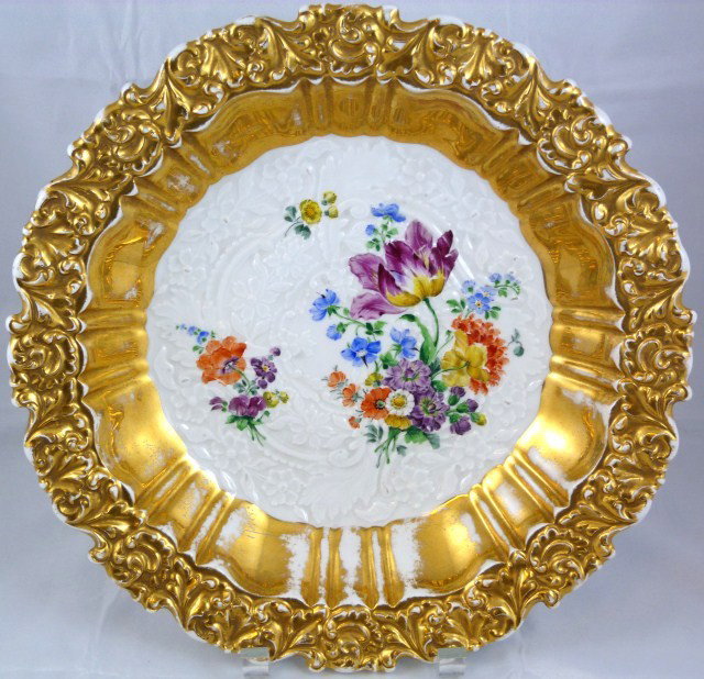 MEISSEN RARE GERMAN PORCELAIN FLORAL BOWL: Beautiful Meissen porcelain large serving bowl. Has gold encrusted border with raised floral design. Center has a raised floral design with hand painted floral decoration. Nice heavy old Meissen porce