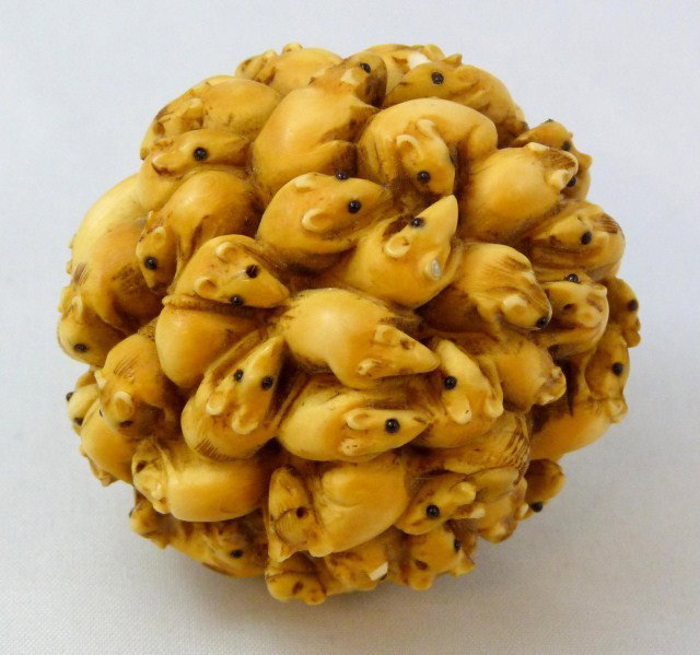 ANTIQUE ORIENTAL IVORY CARVED 1000 MOUSE / RAT BALL: Meticulously hand carved 1000 mouse oriental ivory ball. Ball is decorated all the way around with carved mouse figures. Each mouse has black beaded eyes. Measures approximately 2 1/4" diameter (5.7cm