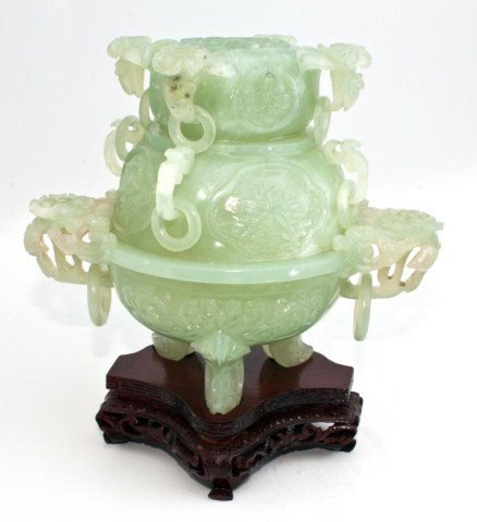 CHINESE HAND CARVED JADE LOTUS INCENSE BURNER: Enchanting oriental carved jade censor. Has a lotus blossom motif. Cover has lotus flower and vine handles protruding with a ring on each. Body has two figural lotus blossom arms with rings. Has three