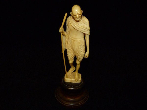 CONTINENTAL IVORY HAND CARVED FIGURE OF GHANDI: Highly detailed European ivory depicting Mohandas Karamchand Gandhi (1869-1948), also known as Mahatma Gandhi. Notice the detail in the face and glasses. No apparent signature. Mid to early 20th centu