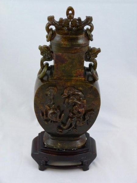 RARE CHINESE RED JADE COVERED DRAGON URN: Has 4 handles with a figural dragon design with rings. Front and back of urn have a raised dragon and dragon ball design. No apparent signature. 19th century or early 20th century. Measures 8'' (20.3c