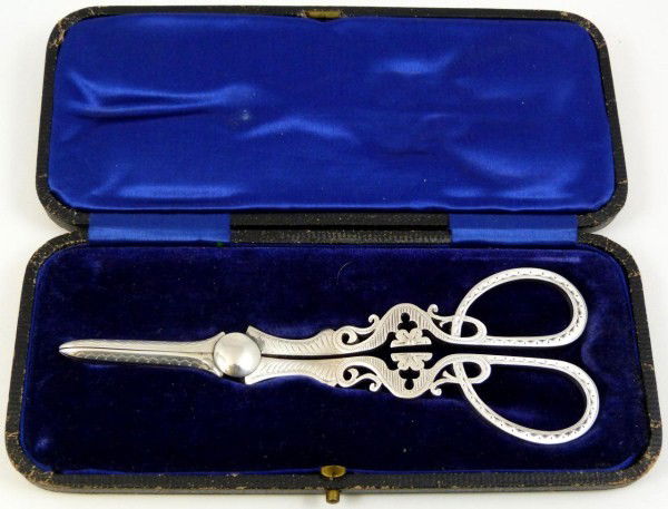 ENGLISH STERLING SILVER GRAPE SHEARS SCISSORS: Beautiful English sterling silver hand chased grape shears. Made by Cooper Brothers & Sons English silversmiths in Sheffield. Has the Lion Passant Guardant silver purity mark. Dated 1903. Includes ori