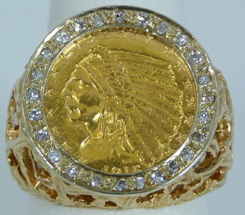 14kt YG MENS COIN & DIAMOND RING: Contains a 1915 Indian Head gold coin surrounded by several round diamonds. Ring size 9. Total weight 9.9dwt (15.3g). Retail price $1500.