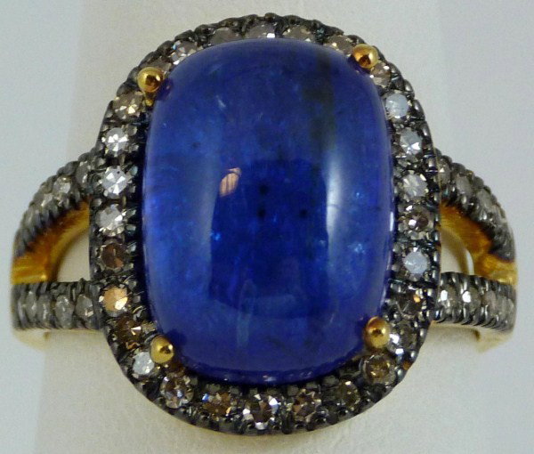VINTAGE 14kt YG SAPPHIRE CABOCHON & DIAMOND RING: Ladies vintage sapphire cabochon and diamond ring. Stamped 14kt. Classic style with split pave set diamond shank holding cushion shaped blue sapphire cabochon, surrounded by frame of pave set diamonds