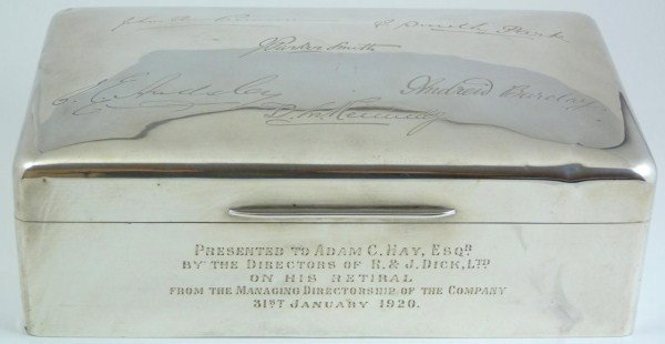 ENGLISH STERLING SILVER CIGAR BOX 1919: Fabulous Charles & Richard Comyns sterling silver cigar box. Box has a polished silver finish design with wood lined interior and leather lined bottom. Marked to lid and lip. Made in London in 1919. H