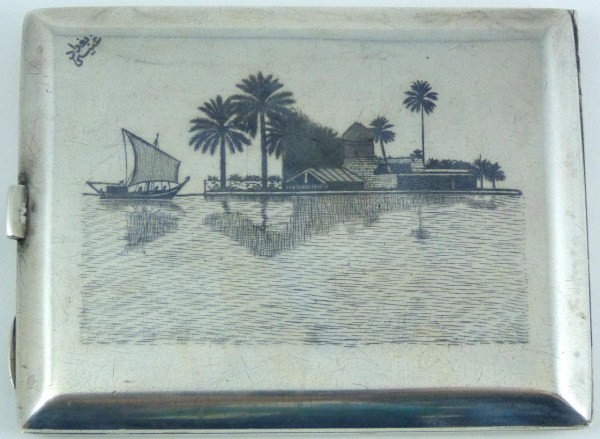 BALINESE SILVER CIGARETTE CASE w FISHERMAN: Depicts a man in a boat fishing with a net to one side. Reverse shows port and boat. Signed to upper left. Gold wash interior. Monogram to interior. Weighs 3.455ozt (107.4g). Measures 3 1/2" L x 2 3/4