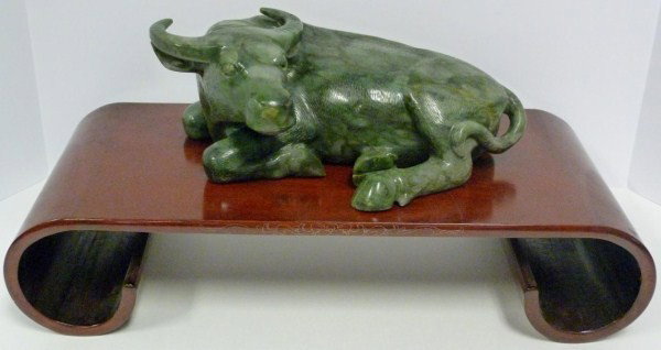 ANTIQUE CHINESE JADE HAND CARVED WATER BUFFALO: Depicts a water buffalo lying down with horns back. Fine detail throughout. 18th/19th century. Measures 4 1/2" height x 12 1/2" length (11.4cm x 31.7cm).