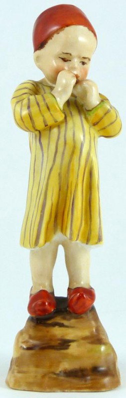 ROYAL WORCESTER FG DOUGHTY FIGURE EGYPT: Royal Worcester World figure depicting boy eating. Represents the country of Egypt. #3066. Measures 5 1/2" height (13.9cm). Guaranteed original.