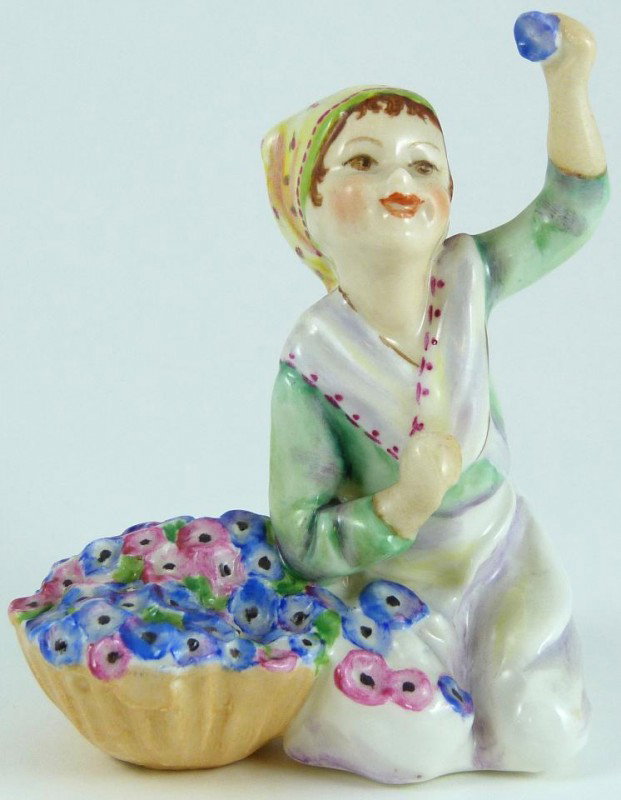 ROYAL WORCESTER FG DOUGHTY FIGURE ITALY: Royal Worcester World figure depicting girl with flowers. Represents the country of Italy. #3067. Measures 3 1/2" height (8.9cm). Guaranteed original.