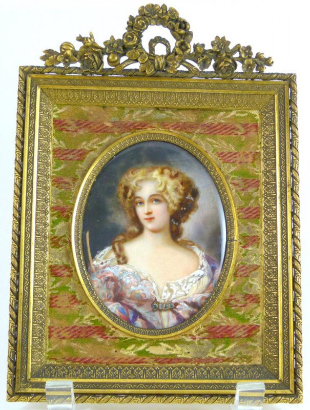 FRENCH OIL PAINTING ON IVORY IN BRONZE FRAME: Oil painting on ivory depicting a young woman. Signed Rodier to right side. Has floral bronze frame. 19th century. Measures 4 3/8" height x 3 1/2" width (11.1cm x 8.9cm). Frame measures 8 1/4" height