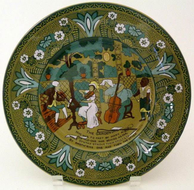 BUFFALO POTTERY DELDARE WARE PLATE SIGNED: Antique Buffalo pottery hand painted pitcher. Pitcher is designed after William Comb's "The Three Tours of Dr. Syntax" poems. The scene depicted on the plate is the garden scene Titled "The Garden Tri