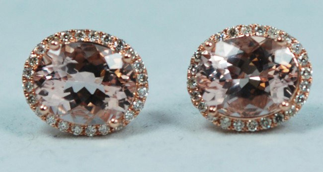 14K ROSE GOLD MORGANITE AND DIAMOND EARRINGS: Pair of 14k rose gold morganite and diamond earrings. 2 oval cut morganite stones 5.22ctw. 48 round cut white diamonds .35ctw. Total weight of 2.62 grams. Each measures 1/2" height (1.2cm).