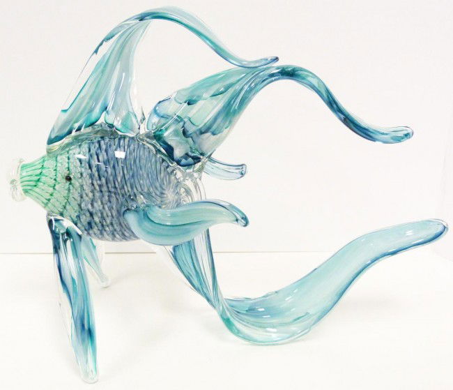 MURANO STYLE BLOWN GLASS TROPICAL FISH: Murano style blown glass tropical fish figure. Designed with blue and green throughout. Measures 11" height x 14 1/4" length (27.9cm x 36.1cm).