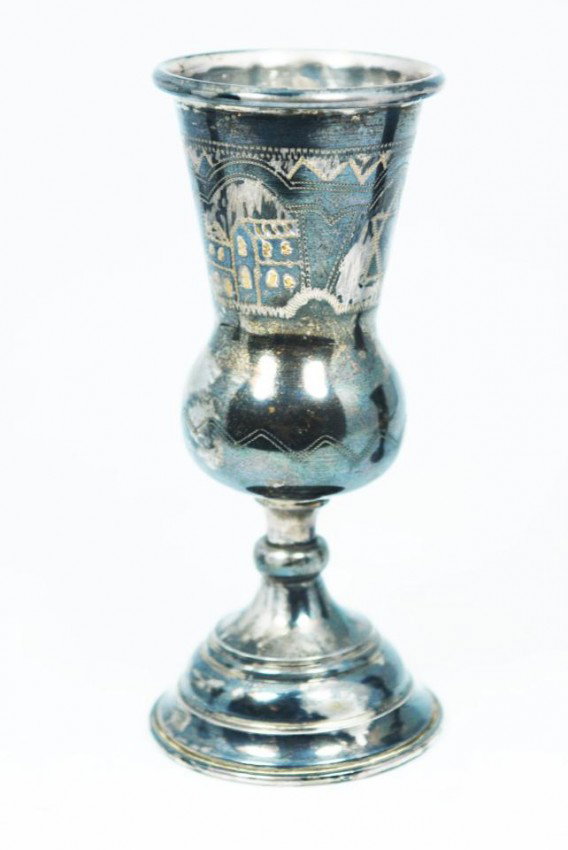 RUSSIAN STERLING SILVER KIDDUSH CUP VILLAGE SCENE: Russian sterling silver Kiddush cup with hand etched village scenes and star of David. Has double headed eagle mark in diamond with silver purity mark. Dated 1902. Measures 5 3/4" height (14.6cm). Wei