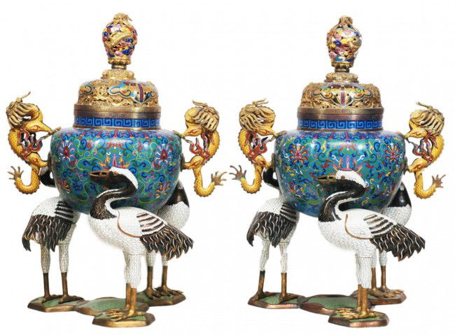 Pr 19th C. CHINESE CLOISONNE FIGURAL CRANE URNS: Pair of anitque Chinese palace sized bronze and enamel cloisonne covered censors. Has 3 figural crane feet. Suspending the body with 2 figural yellow dragon handles. Reticulated dragon design to cover