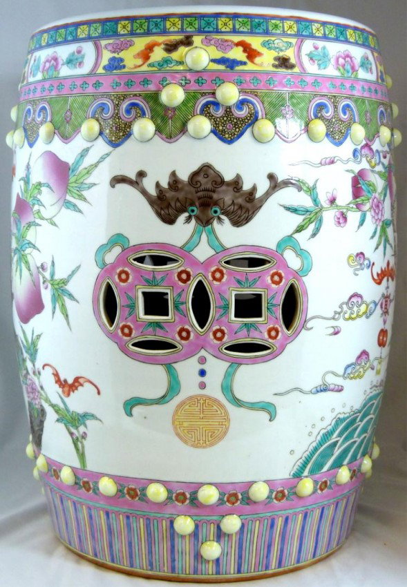 19th CENTURY CHINESE BAT & PEACH GARDEN SEAT: Has a beautiful hand painted enameled design. Depicts bats of long life with double coin design. Also depicts peach trees. Has raised beaded pattern. 19th century. Measures 18 1/2" height 14" diameter