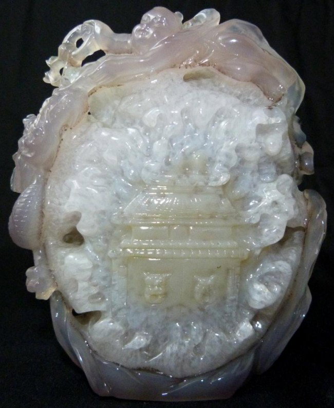 EXQUISITE LAVENDER & MUTTON FAT JADEITE CARVING: Intricately carved Lavender and mutton fat jadeite relief carved stone depicting a temple with dragon and child god. Exceptional translucence to jadeite. Measures 5" height x 5" width (12.7cm x 12.7cm