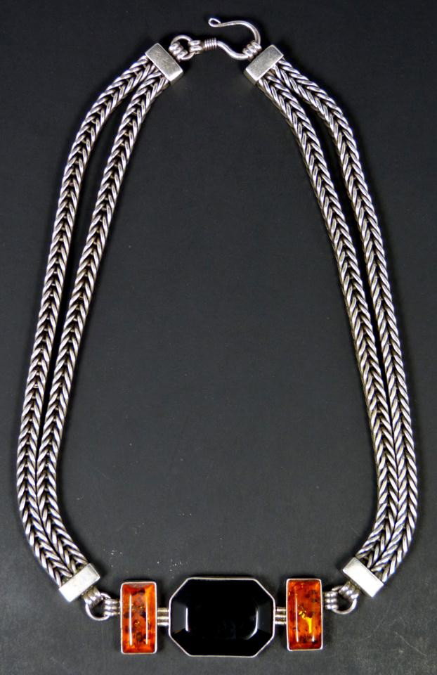 DECO 925 STERLING, ONYX, & AMBER DESIGNER NECKLACE: Vintage art deco sterling necklace with onyx and amber. Has box link chain. Marked Lori Bonn to reverse. Measures 17 1/2" length (44.4cm). Weighs 141.6 grams / 4.552 ounces troy.