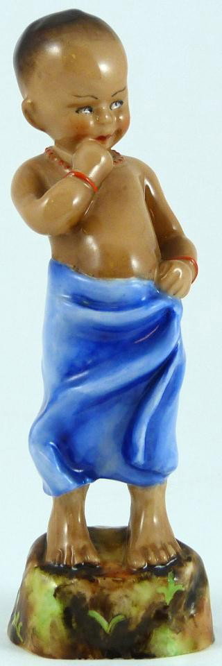 ROYAL WORCESTER FG DOUGHTY FIGURE BURMA: Royal Worcester World figure depicting boy. Represents the country of Burma. #3068. Measures 4 7/8" height (12.3cm). Guaranteed original. Condition: Great. No apparent chips, cracks, crazing, breaks o