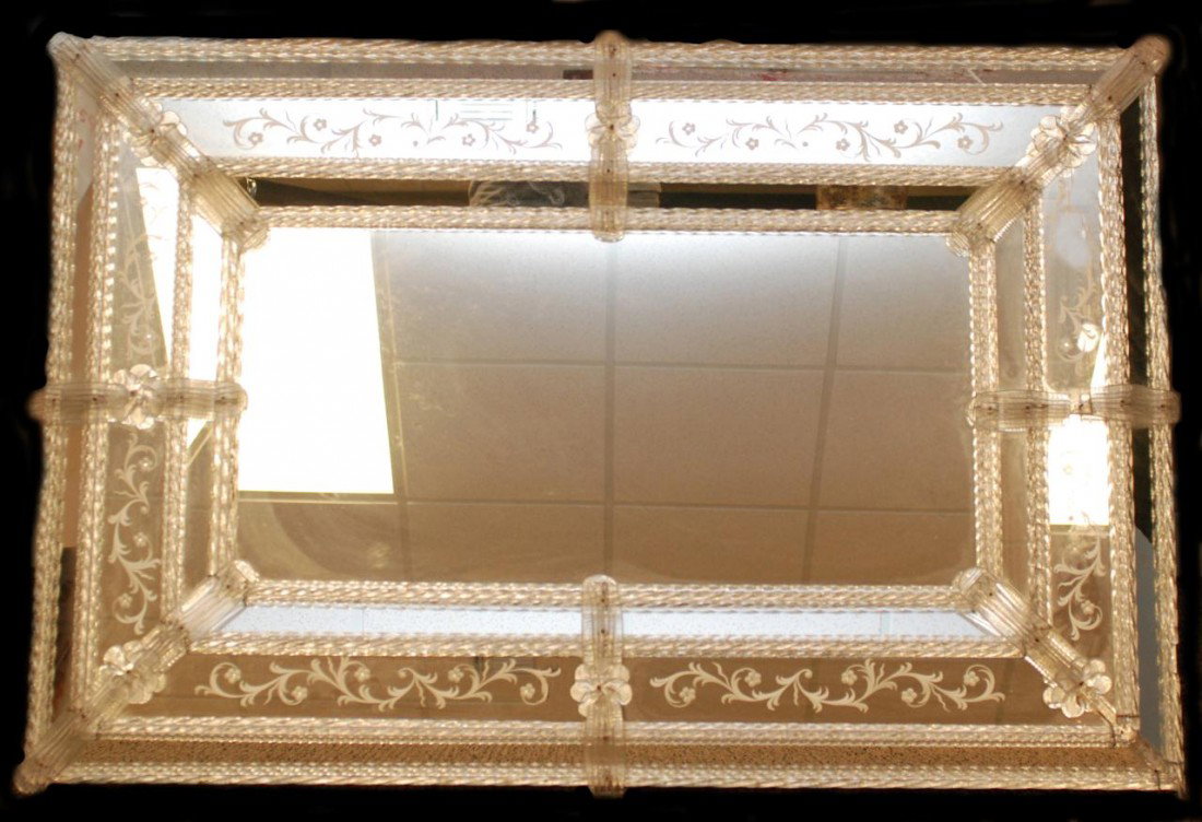 ANTIQUE VENETIAN MOLDED GLASS HALL MIRROR: Antique Venetian glass hall mirror having hand etched floral decoration and spiral glass cladding with figural flowers.