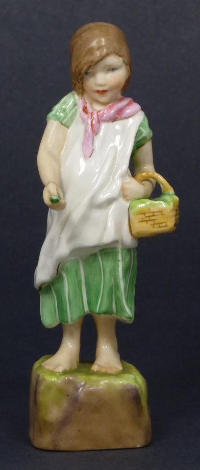 ROYAL WORCESTER FG DOUGHTY FIGURE IRELAND: Royal Worcester World figure depicting girl with basket. Represents the country of Ireland. #3178. Measures 5 3/4" height (14.6cm). Guaranteed original. Good. Has small chip to tip of vegetable in wom