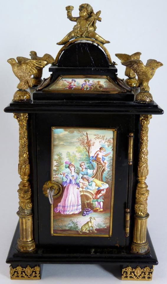 ANTIQUE FRENCH BRONZE ENAMEL WOOD CASKET INKWELL: Has hand painted panels depicting scenes of courting couples, children and cherubs. Black laquer wooden body. Has bronze figural birds, cherubs, pillars and cladding. Opens to reveal three drawers and