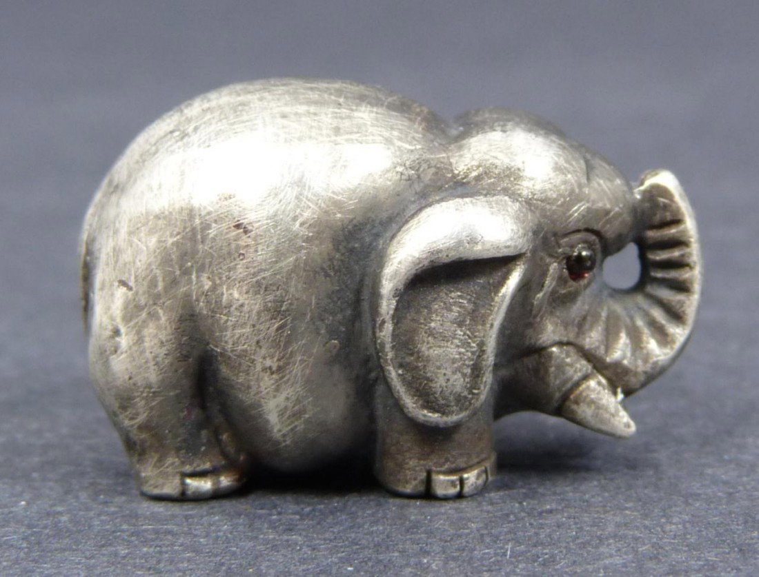 RUSSIAN SILVER ELEPHANT FIGURE SIGNED: Solid Russian silver elephant figure. Finely crafted. Has purple cabochon bezel set stones to eyes. Hold Julius Rappaport Cyrillic workmaster marks to bottom. Holds 84 silver purity marks with St. Pet