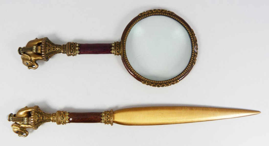 2pc DECO STYLE ENAMELD ELEPHANT LETTER SET: Art deco enamel on copper magnifying glass and letter opener desk set. Has an elegant brown enamel guilloche design over copper. Has figural elephant design to handles. Magnifying glass has approximat